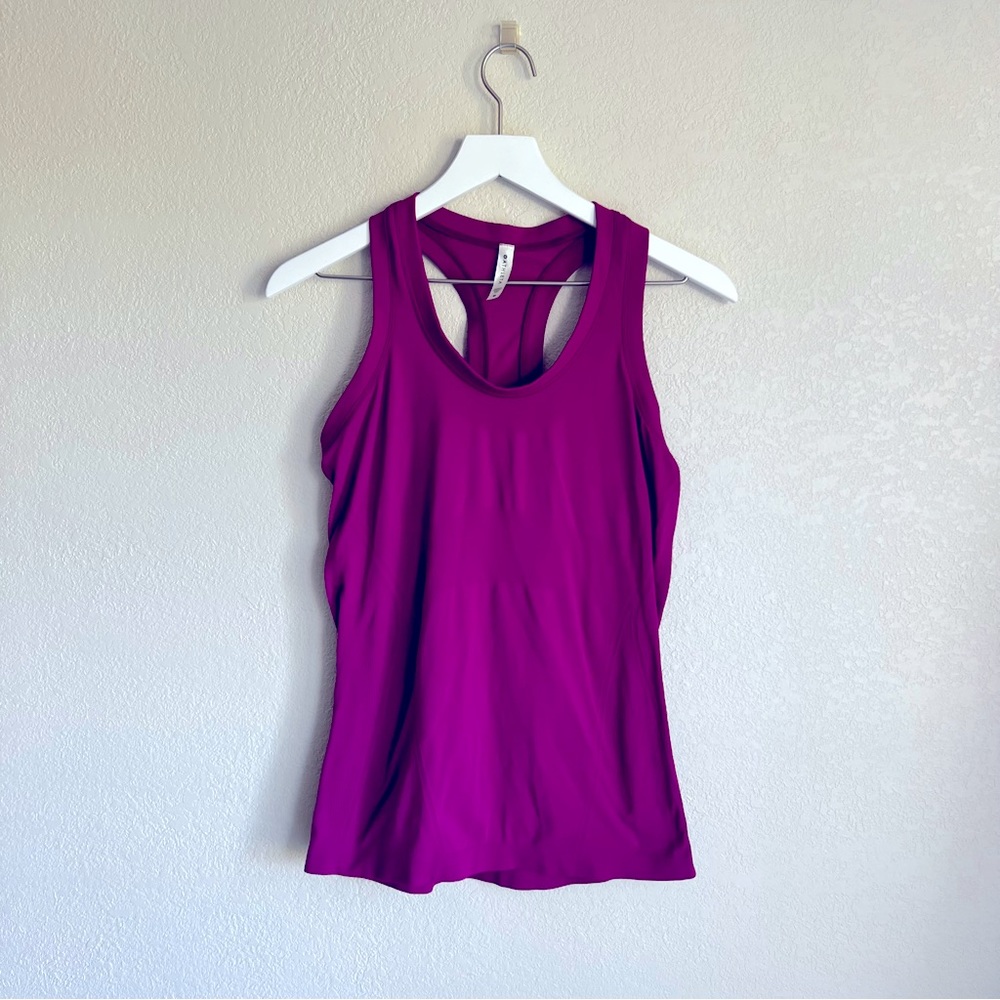 Pink raiser back Athleta tank top size medium